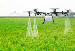 4 drones are sprinkling liquid of the crop