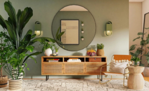 An elegant living room with a mirror, decorative plants, and a wooden table, offers a serene and welcoming environment.